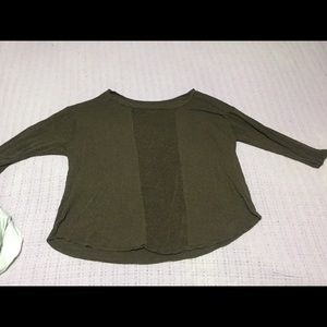 Brown long sleeve with knit material.